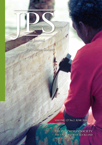 Sehuri Tave adzing the exterior of a tamāvaka hull at Sialeva Point on the Polynesian Outlier of Takū. Photograph by Richard Moyle.